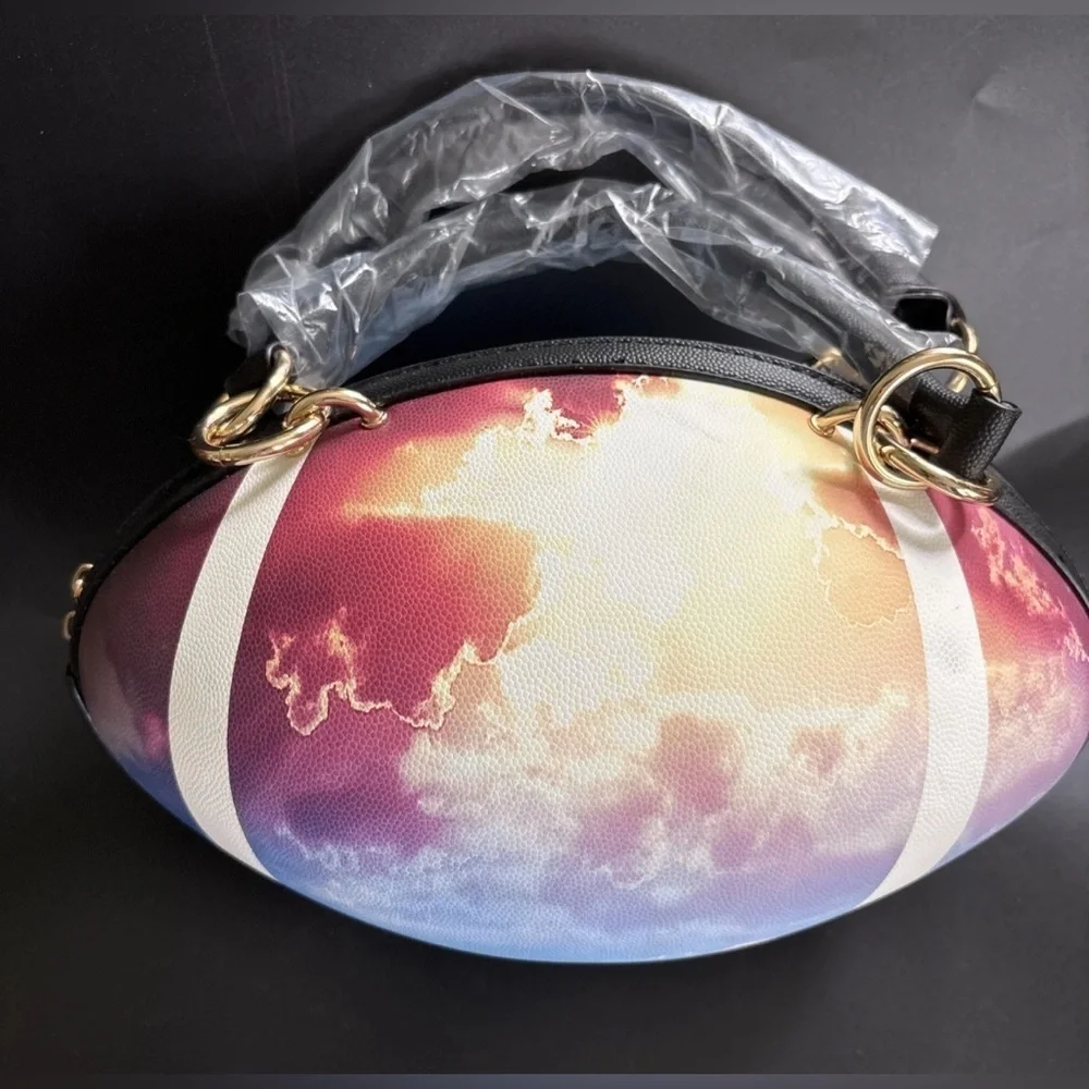 NWT-whimsical tie-dyed clouds  Pristine pebbled Rugby football purse gold chain